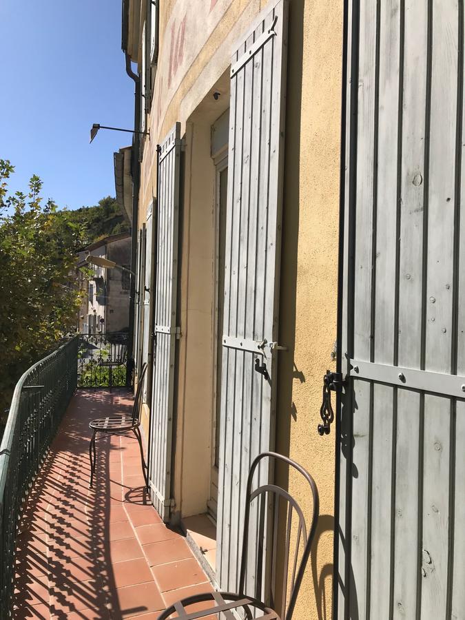 Bar Hotel De La Place Mezel 外观 照片