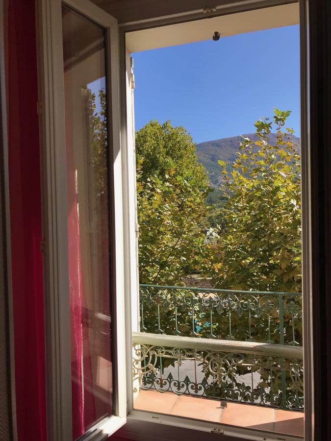 Bar Hotel De La Place Mezel 外观 照片